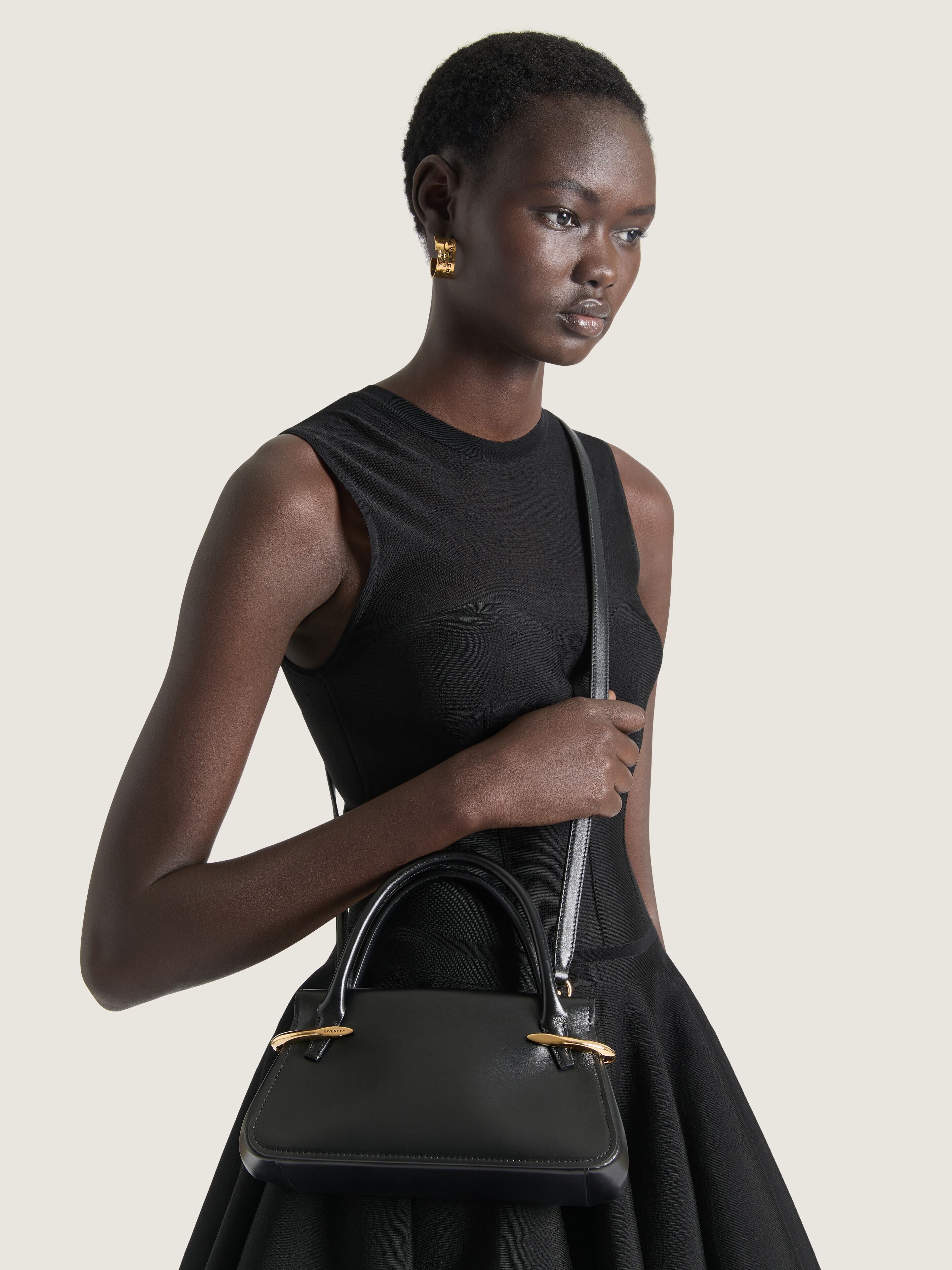 Mini Pinch bag in leather